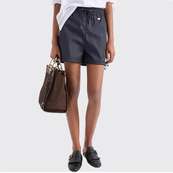 프라다 Re Nylon shorts 22C940 1WQ8 F0SVF S OOO 명품 | 명품하우스